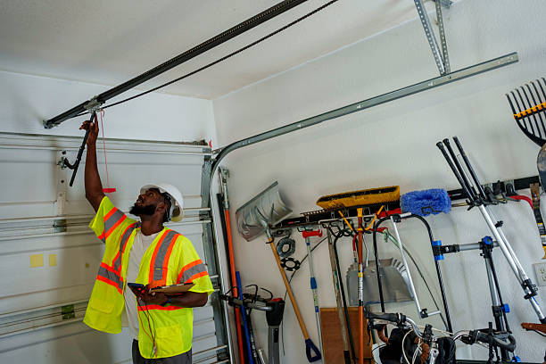 Professional Garage Door Panel Replacement technician working in Mitchell County County, IA